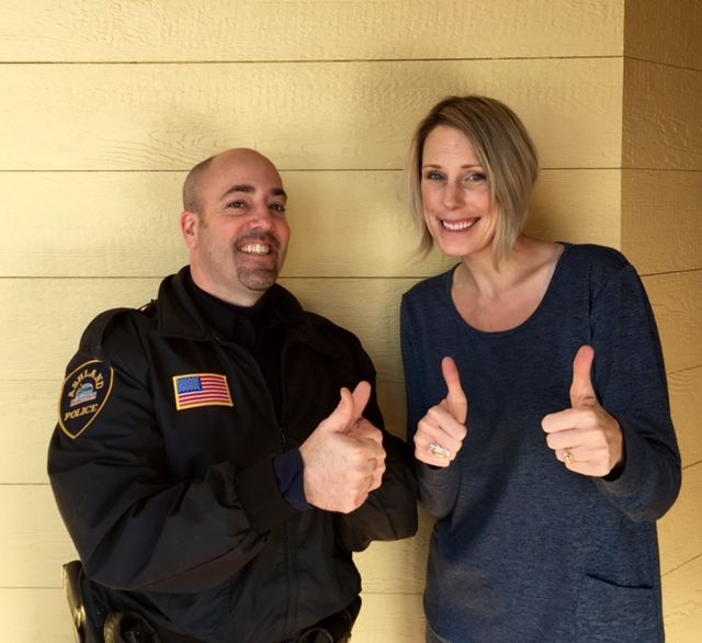 Jim Gregoire Interim Chief and Katie Gellatly Ashland Foundation Board celebrate the Secret Santa Fund